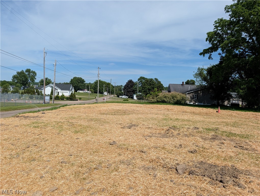 Build-ready opportunity in the desirable Tuslaw Local School District! This 0.37-acre residential lot has already undergone major site preparation, including demolition of the previous structure, professional backfilling, grading, seeding, and straw coverage. A 155-foot well remains on the property and has been scoped and brought up to code, offering significant value and savings for future construction. The lot provides a clean, open homesite with established utility history and excellent potential for a custom home. Conveniently located with a rural feel while still offering easy access to Massillon, Canton, and surrounding areas. Rare chance to purchase a prepared homesite less than a mile from Tuslaw Schools with no zoning and no city taxes!