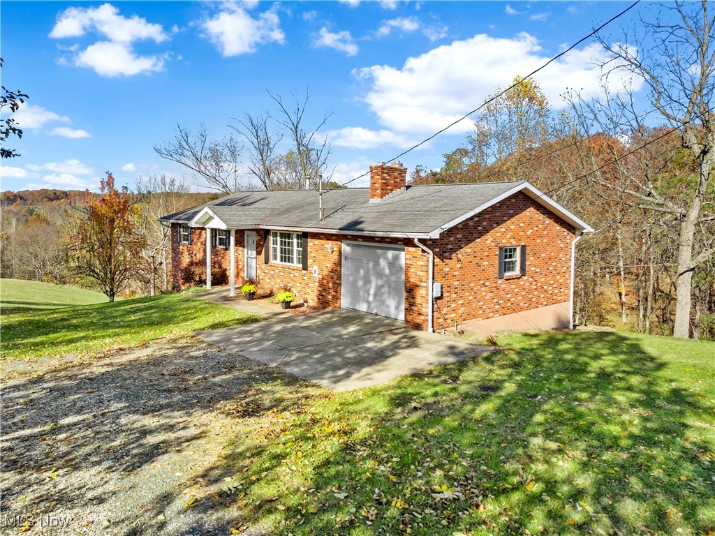 Welcome to this well-maintained 3 bedroom, 2 bathroom home offering the perfect blend of comfort, functionality, and privacy. 4+ acres awaits your garden, pool, apiary or whatever your heart desires! A bright and inviting main living area flows into a practical kitchen and dining space. The finished basement offers additional living and storage options making it ideal for a family room, hobby space, home gym, plus a bonus space for guest accommodations. Car enthusiasts, hobbyists, and those who need serious workspace will appreciate the attached garage for everyday convenience along with the detached block garage that includes workbenches, 200 amp power, and plenty of room for tools and projects. Whether you are looking for a quiet retreat or a property with space for your passions, this one is ready to welcome you home. Listing agent is part owner.