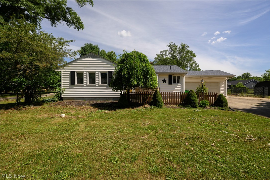 Nestled on a nearly half-acre corner lot in a peaceful, quiet neighborhood, this charming ranch offers the perfect blend of modern updates and comfortable living. Attractive curb appeal welcomes you home, highlighted by a new roof and gutter guards installed in 2023 for added peace of mind. Inside, you'll find a fresh and inviting atmosphere with updated neutral paint throughout the main living areas and two comfortable bedrooms. The thoughtfully designed layout provides a functional flow, with the full bathroom conveniently tucked away from the main entertainment spaces. The kitchen serves as the heart of the home, offering ample cabinet space, an open-concept feel, and all appliances included, making your move-in process seamless. Just off the main level, the partially finished basement provides valuable additional living space ideal for a home office, gym, recreation room, or hobby area. A shower and sink are already in place, offering the potential for an additional full bathroom with the installation of a toilet. Step outside to enjoy the fully fenced backyard, perfect for pets, play, or entertaining. The spacious deck creates an ideal setting for summer gatherings and weekend cookouts. Storage is plentiful with a two-car garage and two additional storage sheds. Major mechanical updates include a new hot water tank in 2024, central air installed in 2018, and a furnace replaced in 2015. Combining important updates, generous outdoor space, and a desirable location, this well-maintained home is ready for its next owner. Immediate possession available. Schedule your showing today before this opportunity is gone!