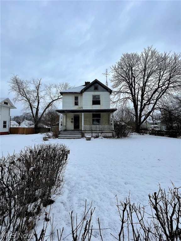 So much potential! Welcome to this four-bedroom home offering some much original character sitting on a huge lot! Brand new kitchen has been started that has soft close doors, white cabinets all open to the dining room. Two fireplaces. There are four bedrooms, two of them are huge. One full bathroom. Huge attic.  So much room for entertaining etc. There are two garages for outside storage.