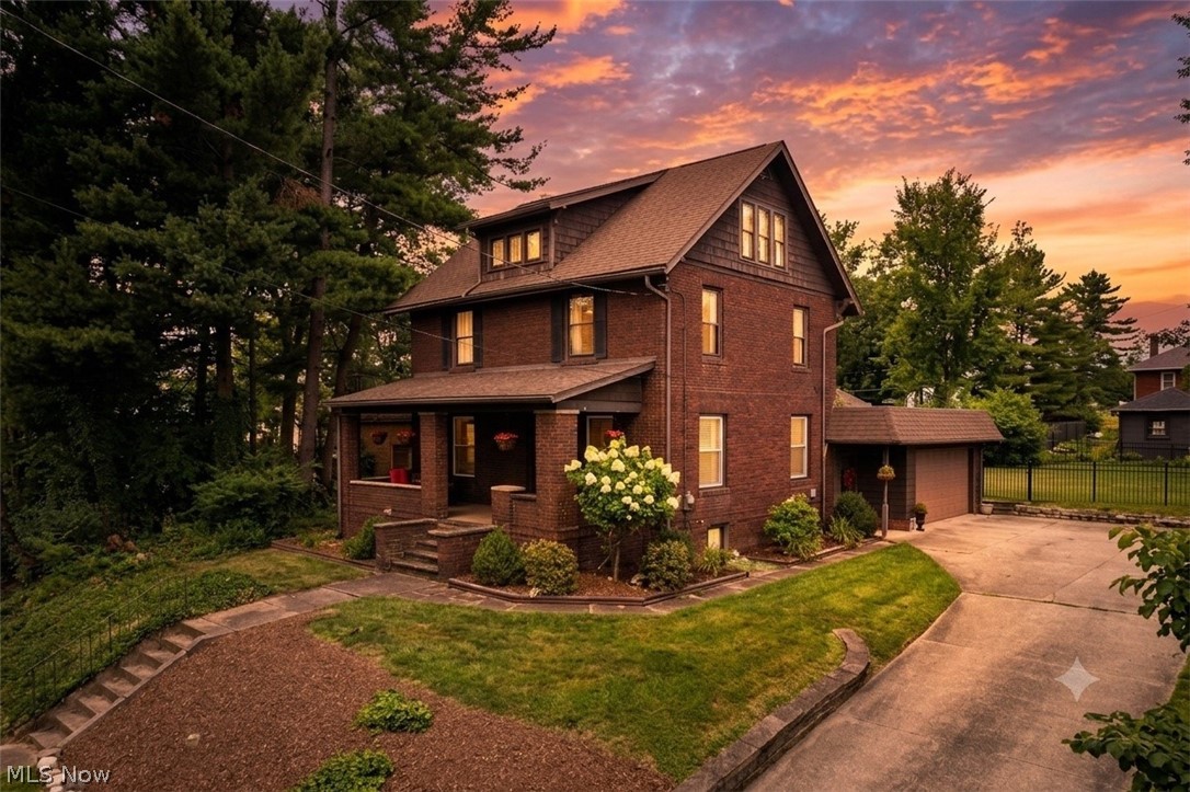 Welcome to 223 Glenwood St SW, a charming and character-rich brick home deeply rooted in North Canton’s historic past as the former groundskeeper’s residence for the famed Hoover estate. Combining timeless history with modern convenience, this unique property boasts excellent structural updates including a 6-year-old roofand updated windows for peace of mind. Step inside to discover gorgeous hardwood floors flowing throughout an inviting interior that centers around a beautifully appointed kitchen. Home chefs will love the elegant quartz countertops, stunning Arabesque tile backsplash, and an abundance of kitchen cabinets providing ample storage space.

The captivating interior is matched only by the incredible outdoor living space. Step out back onto the serene deck—complete with an enchanting trellis—to take in the view of a massive, flat, fully fenced backyard that offers endless space for recreation, pets, and outdoor gatherings. Complete with a handy garden shed for extra storage, this impressive property seamlessly blends historic legacy with modern comfort in the heart of North Canton.