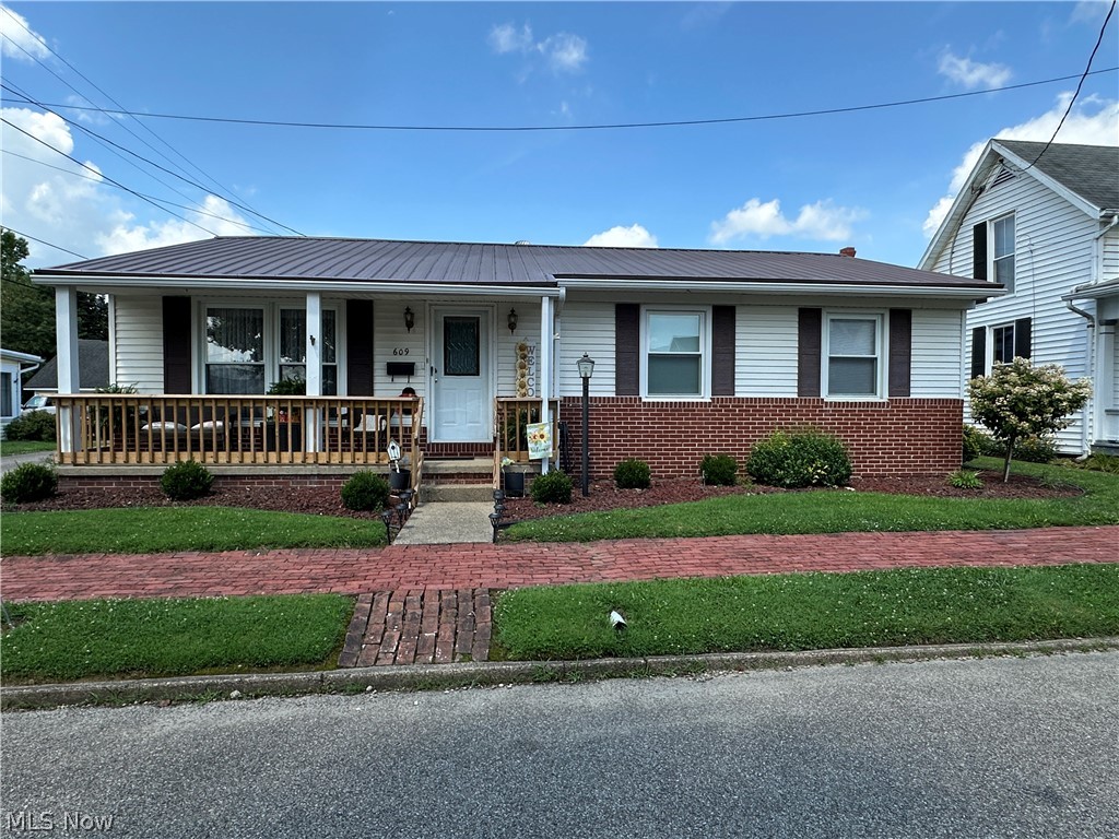 Don't MISS this well-maintained ranch home in the heart of Caldwell village. This 3 bedroom home has a large bedroom with a large walk in closet and 2 equal sized additional bedrooms with plenty of storage. There is s 4th room you could use as a bedroom, or office space as well. The home interior is the perfect layout with a nice living room and generous sized eat in kitchen complete with refrigerator and range. The laundry room is just off the kitchen with plenty of storage and washer and dryer stay with the home. The front porch is so inviting to enter the home, and the back covered porch leads to the carport. The patio is nestled in the back of the home giving this home plenty of spaces to enjoy the outside. Beautiful landscaping makes this home feel and look so cozy! With a small manageable yard, you have plenty of time to take in the amenities of the Caldwell Village. Metal roof is approx. 12 years old, and roof over back porch and new railing on the front porch have been done within the last year. CALL for your showing!