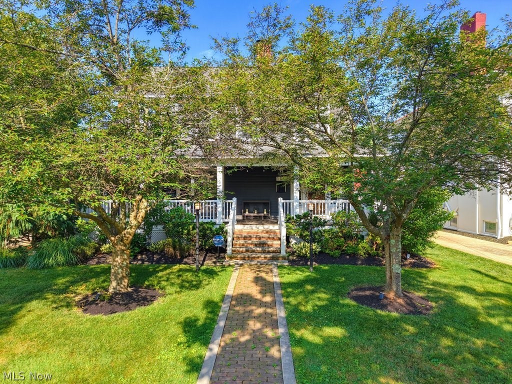 Nestled in the heart of the Village, this charming 3-bedroom, 2.5-bath home is full of timeless character and sits on an oversized lot offering exceptional privacy, surrounded by mature landscaping. Enjoy peaceful mornings on the welcoming front porch and unwind on the fabulous back porch overlooking the beautifully secluded backyard.

Inside, you’ll find gleaming hardwood floors throughout, stunning original stained-glass windows, and an abundance of architectural charm that creates a warm and inviting atmosphere. The spacious first floor features an oversized living room, perfect for entertaining or relaxing, while the home’s thoughtful layout seamlessly blends historic character with everyday comfort.

Additional highlights include a rare 3-car garage, a clean and dry partially finished basement offering flexible living and storage space, and a location within the highly sought-after Chagrin Falls Exempted Village School District. This is a rare opportunity to own a home with generous outdoor living spaces, incredible privacy, and timeless Village charm—all just moments from the shops, restaurants, parks, and everything downtown Chagrin Falls has to offer.