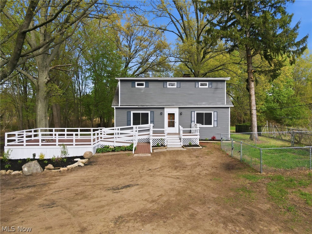 Welcome to this beautifully renovated 4-bedroom, 2 full and 1 half bath Cape Cod in Madison, Ohio! Situated on 2.02 acres, this home has been completely remodeled from top to bottom with major updates including plumbing, central a/c, furnace, ductwork, electrical, flooring, cabinetry, and more, offering peace of mind and modern style throughout.
The main level features a spacious primary suite with a private full bath, along with wheelchair-accessible entryways and ramp access to both the front entrance and an inviting deck, designed for comfort and convenience.
Downstairs, enjoy a finished basement complete with a rec room and wet bar, perfect for entertaining, plus a utility/laundry area and two additional rooms ideal for storage or potential expansion into extra living space.
Outside, the property truly shines with a massive 8-car garage/pole barn equipped with electric, high ceilings, and a car lift, an absolute dream setup for car enthusiasts, hobbyists, or additional workspace needs. A concrete slab in the backyard provides the perfect space for gatherings, barbecues, and outdoor entertaining.
With thoughtful updates, flexible living space, and room to grow both inside and out, this move-in ready home offers the perfect blend of function and style. Don't miss your opportunity to make it yours!