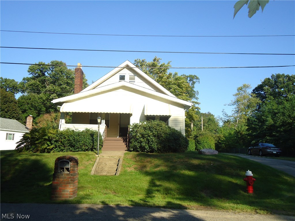 Don't miss this one!  Beautiful 3/4 Bedroom home loaded with charm and character.   Natural trim & refinished hardwood flooring on 1st floor . Freshly painted thruout.  Updated kitchen with breakfast bar  opens to dining room and living room. A great place to entertain or have family functions.  2 bedrooms and 2 FULL baths on 1st floor......  1st floor laundry too!  Upstairs is a huge master bedroom with 2 large rooms....could easily be the 4th bedroom.  The 9' ceilings add an open feeling throughout the 1st floor living area.  Outside, enjoy your park-like setting... quiet area....over 1/2 acre lot...fenced back yard with garden area and shed.  2 car detached garage too!  This is like country living in the city....yet just steps to Galt Park and Brookledge golf course.  Call today for your private viewing...you'll be glad you did!