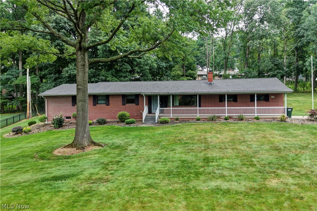 4-bedroom, 3-bath ranch home with additional lot! Total acreage is 1.71 acres. There was an addition to the home making it much larger. 3 bedrooms and 2 bathrooms are on the main floor, 1 bedroom (which in now being used as an office) and a bathroom are in the lower level. Other lower-level features are a family room with a fireplace, and a weight room. Screened in porch off of the kitchen, (Patio furniture stays) newer tile and quartz countertops in kitchen. 2 car attached garage, located in Beautiful Willow Glens.