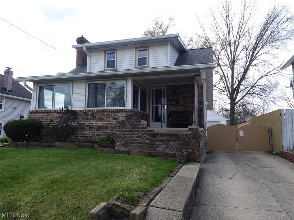 This property is full of character and charm and is on a dead end street!  Enjoy the spacious living room with fireplace, all season sun room, updated kitchen and full bath, family room with barn door and sliders to awesome, huge deck.  There are 3 fireplaces in this home (living room, kitchen area, and recreation room). The recreation room is amazing with an awesome wet bar, fireplace and half bath. The backyard is really nice with the huge deck, 2 car garage and covered patio off the garage - perfect entertaining space.   Updates include:  Kitchen cabinets, granite counters, sink, faucet, garbage disposal, light fixtures - 2016; AC - 2015; Furnace, Hot Water Tank  & Windows - 2014; barn door, garage door and door opener & baths - all updates done 2015 - 2019.  Close walk to Goodyear Heights Metro Park.  Ellet schools.