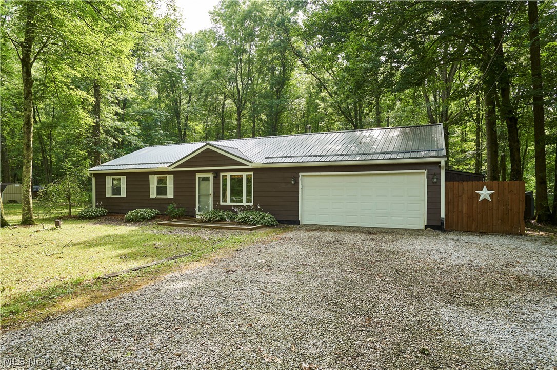 Opportunity awaits with this 3-bedroom home in the highly desirable Kenston School District! Nestled on a spacious lot in a convenient location, this property offers the perfect blend of privacy and potential. The fully fenced backyard creates a peaceful retreat with plenty of room for pets, entertaining, gardening, or simply enjoying the outdoors, while mature surroundings provide a sense of seclusion. Multiple outbuildings offer excellent space for storage, hobbies, or a workshop. Whether you're looking for your first home, a property to personalize, or an investment in a sought-after location, this home presents endless possibilities. Enjoy the charm of country-style living with easy access to schools, shopping, dining, and major commuter routes.