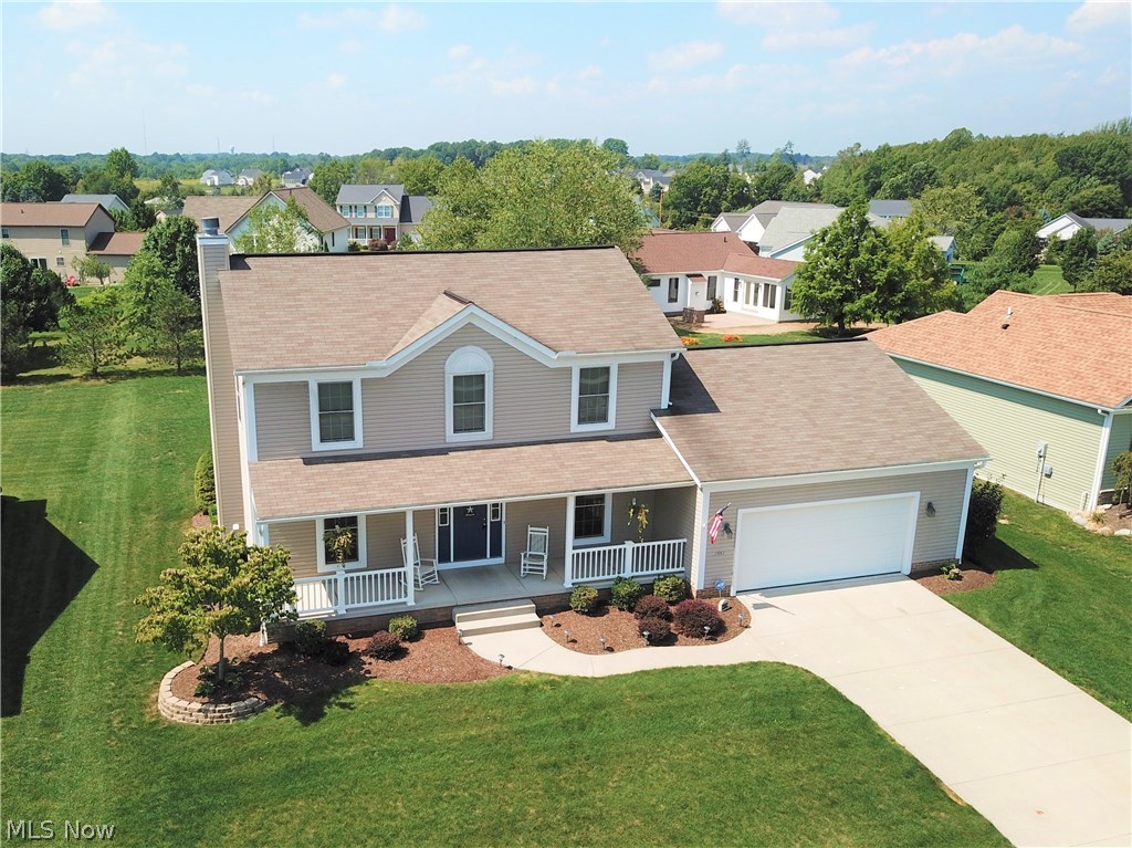 This 3-bedroom, 2.5 bath home that has been beautifully maintained! The large living room with a fireplace and eat-in kitchen are open and flow into each other. Beautiful new floors throughout the foyer and kitchen. The dining room offers a nice spot for more formal dinners. Quick access to the spacious deck and backyard through the sliding glass doors in the eat-in kitchen. Laundry  and half bath are conveniently located on the first floor. Head upstairs to find the master suite with a walk-in closet and full bathroom, two additional bedrooms, and another full bathroom. The covered front porch offers a peaceful spot to relax. Call today for a private showing!
