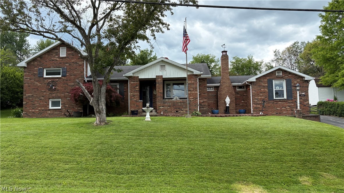 Charming 4 bedroom americana brick home, featuring a custom country kitchen, main bedroom and office space on the first floor, 2 furnaces, 2 hot water tanks, 2 central air units, and transfer switch for a generator. The fireplace can be converted back to wood burning. Detached 2 car garage with additional storage.