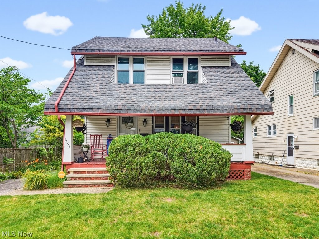 Fall in love with this charming and updated 3-bedroom, 1-bathroom colonial, blending classic character with essential modern updates. From the street, the deep front porch invites you to sit back and relax. Step inside to a spacious, light-filled living room featuring a cozy white brick fireplace, timeless built-ins, and newer windows. The main level seamlessly flows into a formal dining room defined by classic wainscoting and vibrant blue accents, complete with sliding glass doors that lead directly out to the rear deck - perfect for al fresco dining and entertaining. The kitchen, with its own access to the deck, offers a unique dual-tone look with navy lower cabinetry, crisp white uppers, gold hardware, and a separate breakfast nook area. Upstairs, you will find three comfortable bedrooms and the full bath. 2-car detached garage. Several recent updates including the roof & water heater (2025) - plus, the seller is offering a 1-year limited home warranty for added peace of mind! Conveniently situated in a walkable, tree-lined neighborhood near highways, parks, and several amenities, this lovely home is a fantastic opportunity for anyone seeking character & convenience in historic Firestone Park.