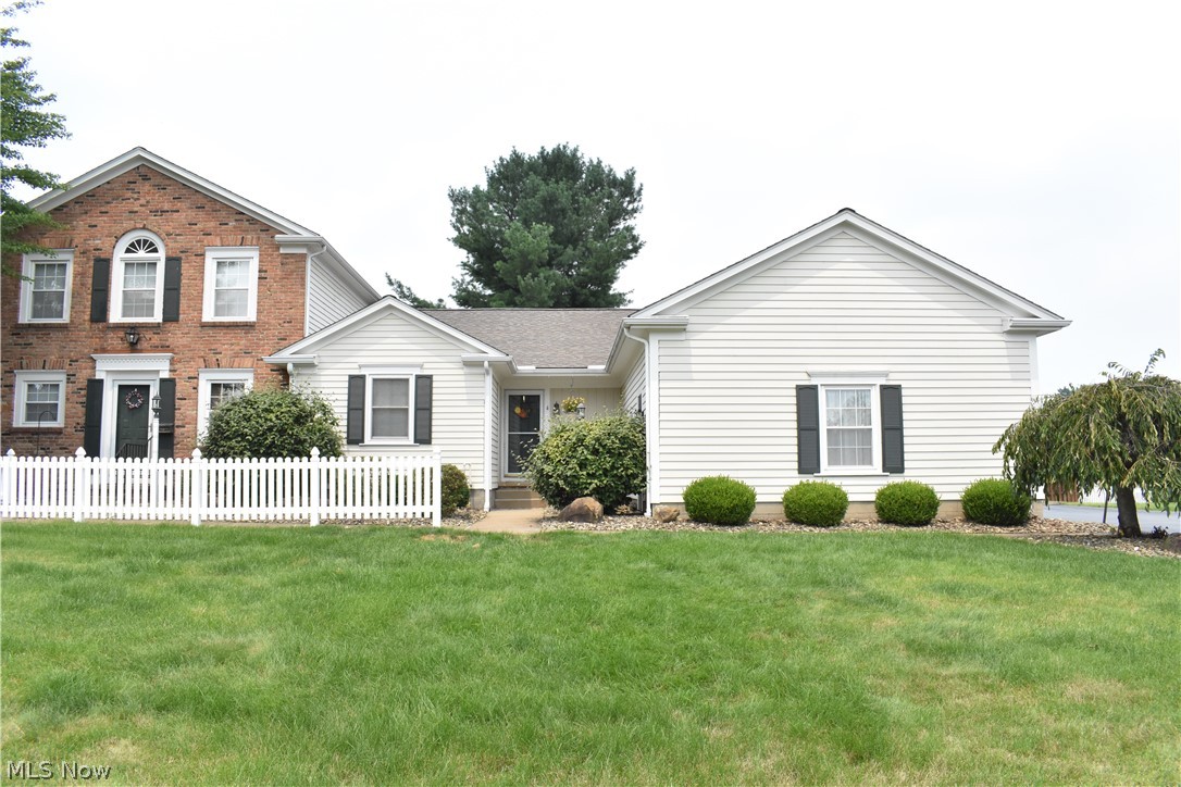 Beautiful, well maintained two-bedroom ranch condo.  This home welcomes you with its warmth and coziness.  The entryway leads you into a spacious living room that flows into dining area and kitchen.  The bedroom area includes a north wing leading into a master bath and then to a large master bedroom.  Additional full bath and second bedroom complete the main living quarters.  First floor laundry is an added benefit to this home.  Yet, enjoy even more space with a finished basement and plenty of storage.  Relax either on your front porch or back deck area.  Attached garage with ramp provides direct and easy access to this home. Updates include:  updated electric panel (2018), backup sump pump (2018) and more.   Come see it before its gone!!