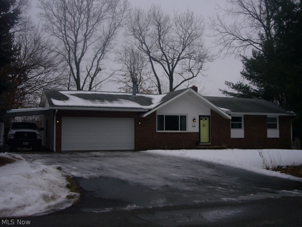 VERY NICE 3 BR, 2.5 BA RANCH HOME IN PERRY!  Just move in & enjoy.  1st floor living in this updated home with finished rec room and sun room.  Home also has a 2 car garage and one car carport.  Upgrades include newer windows, interior doors, laminate flooring, lighting and more ..... a must see .... Perry schools too!