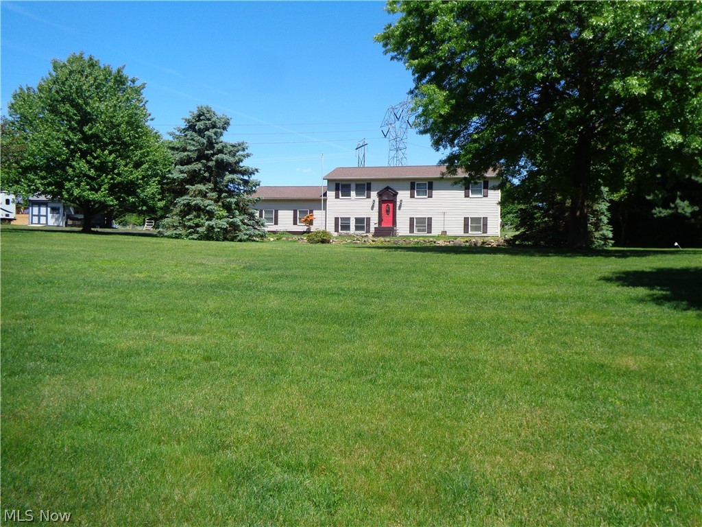Country Living! Enjoy the clean air and peaceful lifestyle being offered by this 4 BR / 3 Bath home situated on 1.75 acres in Shalersville Township. Open floor plan. Tastefully remodeled throughout. Granite countertops and newer SS appliances in kitchen.  The multi-tier deck along the rear of the home is a perfect place to take in the scenic surroundings. Possible in-law or teen suite in lower level. There is also a 20 X 40 outbuilding that offers many possibilities.