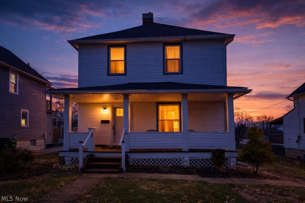 Welcome to this charming Colonial tucked away in peaceful Rittman, Ohio. Blending timeless character with thoughtful modern updates, this pre-Depression era home is move-in ready for today’s lifestyle. A welcoming front porch sets the tone—perfect for relaxing evenings or greeting neighbors. Inside, the grand foyer showcases beautifully refreshed woodwork that highlights the home’s original craftsmanship. The sun-filled living room flows into a formal dining room, complete with a stylish pendant light ideal for everyday meals or entertaining.Toward the rear, a cozy sitting room offers a quiet retreat, along with the first of two fully remodeled bathrooms. The updated kitchen features brand-new stainless steel appliances, quartz countertops, and fresh finishes, while new vinyl plank flooring throughout the main level adds a clean, cohesive look. Upstairs, you’ll find three spacious bedrooms with fresh paint, new carpet, and ceiling fans. A former fourth bedroom has been transformed into a stunning full bathroom with double vanities—perfect for busy mornings. Additional flexibility comes with a rear entry space already plumbed for first-floor laundry, with existing laundry still available in the lower level. Major updates provide peace of mind, including a new furnace and central air, updated flooring throughout, new kitchen appliances, new doors, first-floor windows, a water heater (2023), and two completely renovated bathrooms. Ideally located within walking distance to downtown Rittman, schools, and parks, this home offers both convenience and charm. Schedule your private showing  with your favorite Realtor today—your next chapter starts here.