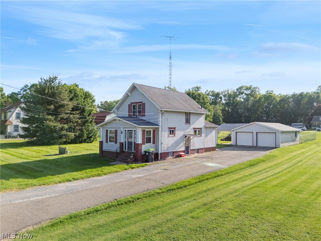 Remarks:  WOW! You do NOT want to miss your chance to see this one! Situated on a double lot at just under an acre, this West Branch Schools property is sure to impress. Enter the front door to find a fully finished sun room complete with heating and cooling. The large living room leads to a fully applianced kitchen and a dining room. Rounding out the main floor is a full bathroom. Head upstairs to find two spacious bedrooms and another full bathroom. Outside you will find a massive garage with room for multiple vehicles and space for a large shop. Off the garage is a fenced in area for a kids play area or space for pets to roam. Call today to schedule your private showing!