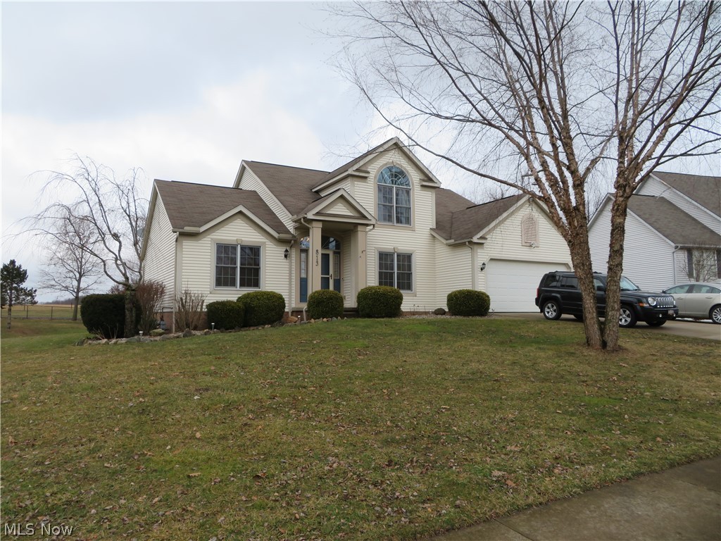 Welcome to your new home on an extra-large lot with an open concept and 2 story foyer. This lovely home features a 1st floor master suite with large bath, open living area the living area features a stone gas fireplace, open to the kitchen a dining area, formal dining room that could be used for an office and first floor laundry. The second story features 2 beds and a full bath and a bonus area that could be finished into a 4th bed if needed. The basement is partially finished with a water softener. From the dining area you can go and enjoy your outdoor oasis with and oversized deck that features a tiki bar that has electric. There is a barn to the back of the lot and John Deere lawn tractor will convey. Possession June 1st.
