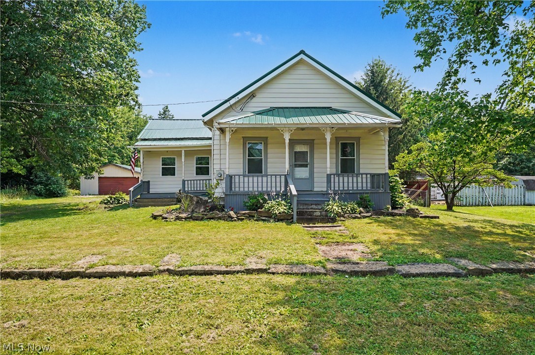 Remodeled Ranch with tons of charm. Spacious kitchen with some newer cabinets.
First floor laundry room. Three bedrooms, full basement. 
Three parcels included totaling 1.77 acres. Detached garage approximately
27 x 29. Minutes away from Interstate 76, Lake Milton State Park, West Branch State Park and Berlin Lake.