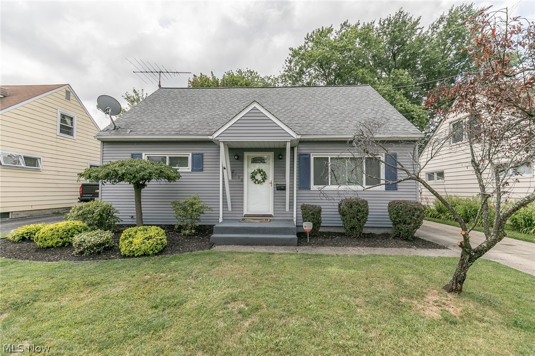 A sensational Cuyahoga Falls Cape Cod with over 1700 square feet of total living space.  This home has many updates, including furnace, a/c, roof, bathroom, and so much more.  The rear yard is completely fenced, with a large 2 car garage, and has a covered patio area.  The finished basement offers approximately 500 square feet of additional living space, with a bar and family room, and is plumbed and ready for a second bathroom.  The large kitchen has an eating area.  A large living room has natural wood floors, which extends to the first floor bedrooms as well.  The master bedroom is 33x13.