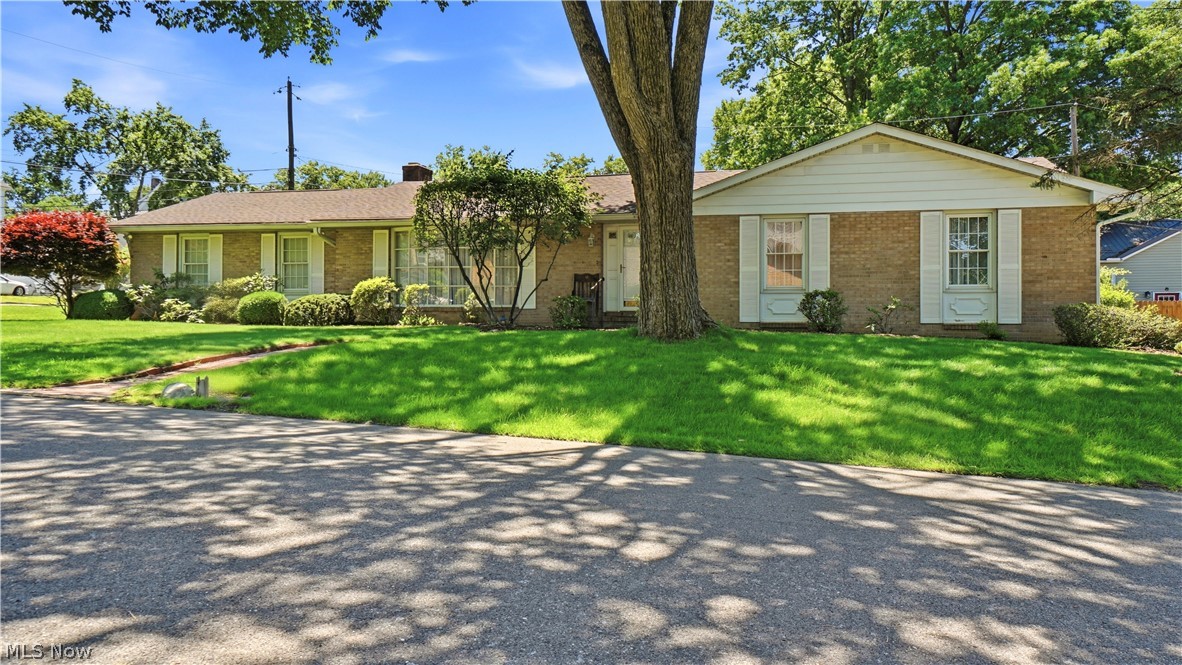 Welcome Home to your well maintained and charming ranch on the north end of Zanesville! This 3 bed 2.5 bath home is a true gem that combines elegance and comfort. As you step through the front door, you'll be greeted by an abundance of natural light that pours into the spacious living room, perfect for entertaining or enjoying cozy evenings with loved ones. This serene neighborhood provides a fantastic spot to enjoy the flexibility offered by the three-seasons room, a versatile space that invites you to enjoy year-round entertaining or relaxation. The finished basement offers plenty of additional space and storage, with a pool table and recreational area for entertainment. The location is hard to beat, with easy access to I70, making commuting a breeze, and just minutes from dining, shopping and everyday essentials. This home truly is one to see! Immediate Possession!
