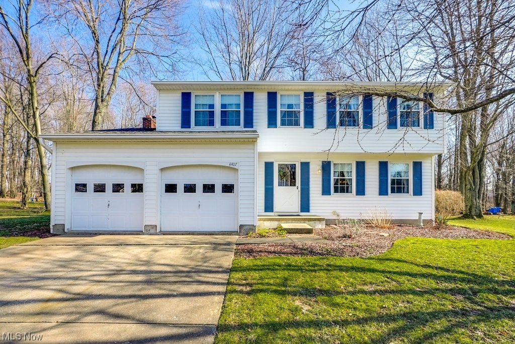 Comfortable Colonial in Stow! Original Owners! This home has 4 bedrooms and 1.5 bathrooms. The living room has hard wood flooring and is open to the formal dining room. The eat in kitchen is very spacious and all the appliances will stay. The family room is very inviting with the wood burning fireplace. There are French doors leading to the sunroom, the natural light provides a sun kissed space. The second level has 4 bedrooms and a jack and jill bathroom. The bedrooms are all good sizes with plenty of closet space. There is a full unfinished basement with a sump pump and crawl space. There is also a 2-car attached garage. The lot backs up to a wooded area.  There is a long list of updated items. Windows 2006, Roof, 2019 Furnace and Air 2018, Vinyl siding and shutters 2015, Downspouts and gutters, drainpipe to the street 2019, new sump pump 2023, gutters guards 2012. Chimney cleaned 2023.