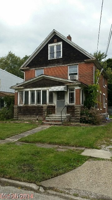 Tons of potential with this brick colonial with slate roof...over 2000 sq feet....big kitchen and living room and dining room...4 bedrooms .....call today for details