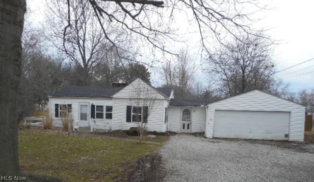 Enjoy One Floor Living In This Ranch Nestled On .71 Acre Lot! Enjoy Country Living Yet Minutes From City Conveniences! Huge Eat-In Kitchen Has Loads Of Cabinets & Counterspace and Will Delight The Cook Of The Family! Relax In The Living Room That Boasts Brick Fireplace! Full Bath With Updates Has Glass Sliding Shower Doors. Breezeway From 2 Car Attached Garage Leads To House. Enjoy Summer Fun In The Yard With Plenty Of Room For Gardening, Toys and Entertaining! Make This Your New Home Today!