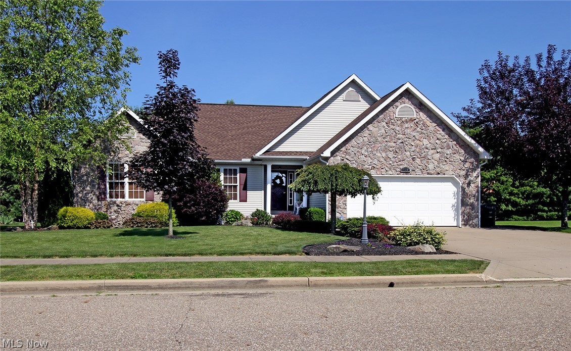 A stunning ranch home with open concept living at its finest! Open the front door, walk into a large foyer and the cathedral ceiling great room with fireplace will warm your heart! This room is open to the large dining room and beautiful kitchen with abundant cabinetry. Lots of room in this fine home for the family. You will enjoy the open concept sun-room and hot tub in the adjoining deck to relax and unwind. The master bedroom and bath are a dream come true! Call today for a personal showing.   Nice Updates including:   New roof in 2016.  
All new updated lighting 2016.   10 x 16 storage building 2017, Hot tub 2016, Beautiful Kitchen back splash 2016.
Gas installed for new gas stove, gas dryer & new gas water heater in 2016    New Insulated Garage Door in 2018