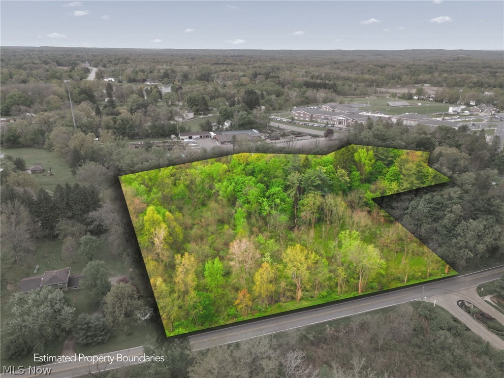 7.78 acres of commercial opportunity in Springfield. This expansive, wooded parcel offers a unique setting with multiple existing structures on site that are currently not in use. Providing potential for redevelopment, repurposing, or a complete reimagining of the property. With ample space and flexible commercial zoning, this is an ideal opportunity for investors, developers, or business owners looking to bring their vision to life. Conveniently positioned with access to major routes, the property offers a balance of privacy, visibility, and future potential.