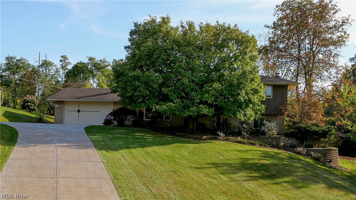 ***OPEN HOUSE CANCELED*** Welcome home to this beautiful and meticulously maintained four level split in North Royalton! Sitting on just over 1/2 acre, this home boasts 4 large bedrooms and 3 full bathrooms! Upon entering, you are greeted by an abundance of natural light flowing through the large windows and patio doors. The kitchen has plenty of custom cabinetry with pullouts as well as enough room for a dinette. Family gatherings are a breeze with a big formal dining room and spacious living room. Upstairs you will find three generously sized bedrooms and a full bath. There is plenty of closet space in each bedroom! The lower level has a gorgeous family room with a gas fireplace, another large bedroom and a full bathroom. The basement provides additional living space with a finished recreation room and another full bathroom! There is also plenty of storage in the laundry room and an easily accessible crawl space. Two concrete patios and a deck make outdoor entertaining easy, all whil