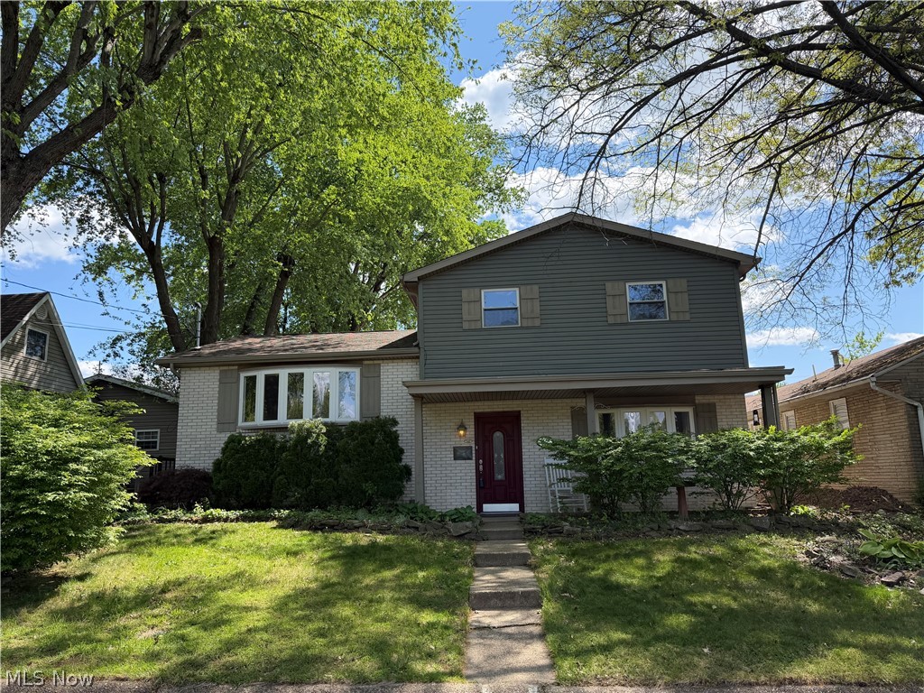 Welcome to 7th Av! This 4 Bedroom, 2 1/2 Bath, Quad Level home has so much to offer! Including an Updated Kitchen, a first-floor bedroom/Office, family room with beamed ceilings & electric stone fireplace, Additional Family Area with French Doors off of the Family Room a 22’x 19’ 2 story Addition with Master Suite & Sitting Room! Home has courtyard leading to the 2 car garage with alley access! Basement Laundry Room has tons of cabinet storage space. Make an appointment to check this one out!