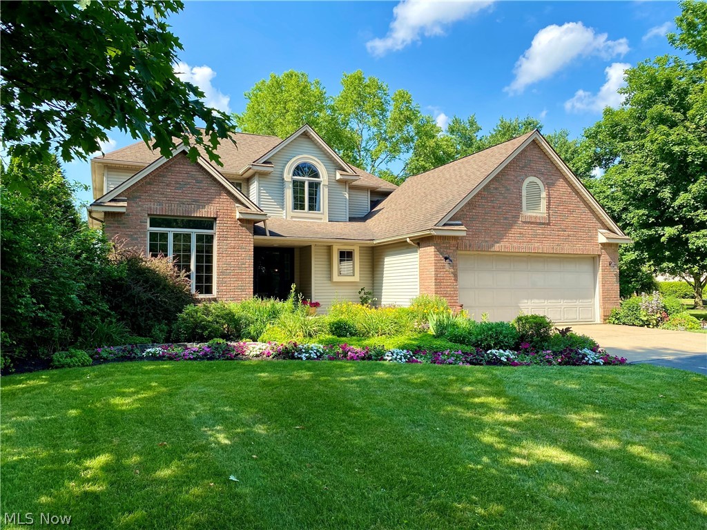 This exquisite property features a custom-built home, ornate landscaping, studio, large pole barn and other outbuildings, all on 12+/- acres. The home features a eat-in kitchen with custom hardwood cabinetry and tiled floor, breakfast nook overlooking the patio, dining room with hardwood flooring, and several spacious sitting rooms. The upper story boasts a master suite that is sure to not disappoint with tray ceiling, large walk-in closet, double-sink vanity, jacuzzi tub, and walk-in shower. Lots of bedroom space with 3 additional bedrooms on the upper floor along with a full bathroom. The full basement has a media room, hosts a bar area set-up in the style of an English pub. Walk out the back door and relax on the patio that features a fireplace & brick oven, along with brick lattice garden wall and waterfall. Additionally, on the home parcel is a studio cottage that was built in a country barn style. There is also a repurposed chicken coop that makes another space for entertaining a