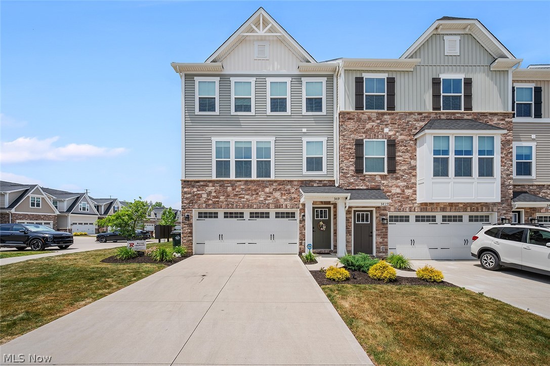 The very definition of move-in ready is here! 3419 Links Dr. is spacious, fresh, and young being built recently in 2023. These owners have taken extra care to maintain this home over the last year, and add value by painting the entire interior, adding ceiling fans, a smart-style washer and dryer, and upgrading to special closet and laundry shelving. Enjoy ample space in the garage, as well as ceiling mounted shelves, and a large crawl space underneath the stairs. You've got a cozy walk out basement that has its own half bathroom, which can act as a gathering space or additional sleeping quarters. The main floor is not only completely open concept, but houses an over-sized island that gives you options for dining at the island or in the dining space. Off of the large living room, you've also got a space that can be used as a homework space or office area that is complete with another half bath. The top floor is where all 3 bedrooms are, as well as the laundry area. 2 healthy-sized bedrooms also share a full bathroom, alongside a large primary suite with double vanity and double shower heads. Don't miss the balcony that offers a serene area to relax. This home has it all, and is also highly accessible to grocery stores, retail shopping, highways, and parks. Swing by today!