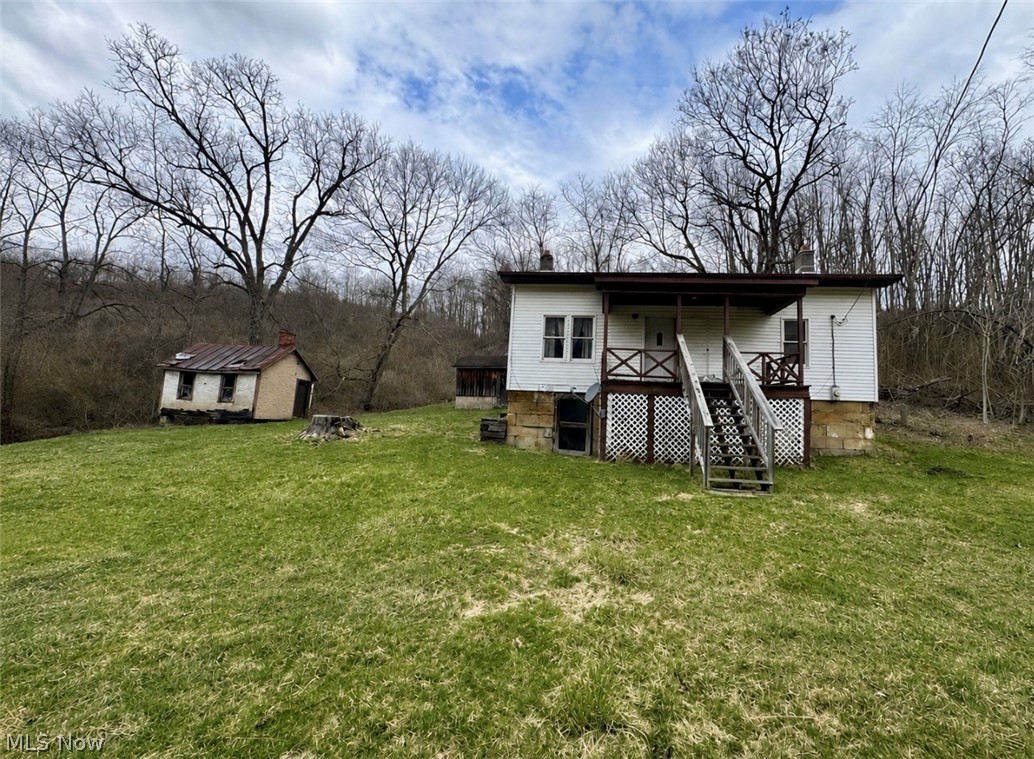 Discover the possibilities with this 40-acre property conveniently located just off State Route 22 in Archer Township! Whether you're looking for a hunting retreat, hobby farm, or your next renovation project, this property offers endless potential. The 2-bedroom, 1-bath ranch home is in need of significant updates and is being sold " ASI-IS", making it a great opportunity for investors or buyers ready to bring their vision to life. The acreage features a blend of open farmland and wooded areas, providing excellent hunting opportunities, recreational use, or space for livestock and farming. A detached garage offers additional storage and workspace. Enjoy the privacy of country living with the convenience of quick access to State Route 22. Bring your ideas and unlock the potential this unique property has to offer!