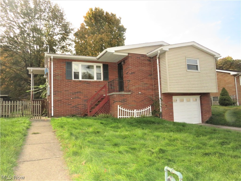 MAKE THE MOVE AND LAY OUT THE WELCOME MAT!  This 3 bedroom, 2 bath ranch home is welcoming from start to finish!  The main level has a living room that leads into an impressive kitchen/dining area with rich cabinets and stainless steel appliances along with 3 bedrooms and full bath.  The lower level offers a finished recreation room and 3/4 bath.  1 car garage, central air and a beautiful, level back yard round out this home ready and waiting for YOU!