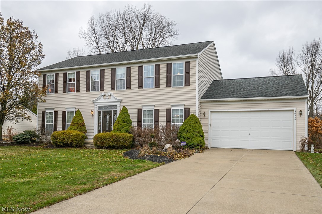 Welcome home to your beautiful Yorkshire model home located in Butternut Grove in North Ridgeville.  This 4 bedroom 2 1/2 bath colonial offers a timeless floor plan and open concept from the eat-in kitchen through the family room.  The chef in your family will love the updated kitchen, which includes, granite countertops, range, refrigerator and dishwasher.  New flooring runs from the foyer through the kitchen and living room.  Upstairs you will find the huge master bedroom with crown moulding and 3 other good sized bedrooms.  Enjoy the evenings from your wood deck overlooking the large wooded backyard.  The roof, A/C unit are only 7 years old and the hot water tank is just 2 years old.  A 1 year home warranty is included for your peace of mind.  Conveniently located close to I-480 and the turnpike.  Call for your private showing today.