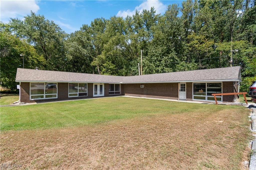 Business Opportunity! A Well maintained Brick building with over 2,600 sq ft and two separate suites located in Franklin Township just North of Canal Fulton. Grow your business and lease opportunities on Manchester Road(Rt 93) just off Akron Road (State Route 236), providing excellent visibility and convenient access. Currently leased with double entries suitable for multiuse businesses. Included is a kitchen area with cabinets. Additional features include handicap ramp access, two bathrooms, utility areas, A/C wall units, hot water steam heat, and ceiling fans. Interior layout offers large open work areas with separation as needed. Roof is approximately 4 years old and the property has been well maintained with records available upon request. Plenty of parking, including garage/storage space.