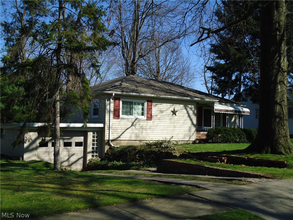 Freshly painted and updated Ranch style home on quiet, dead-end street in an area of well kept homes!  Beautiful hardwood flooring throughout!  Gorgeous updated bath (2010) from the studs out!  Spacious  living room with picture window.   Large eat-in kitchen with appliances.    Newer vinyl siding and dimensional  roof.    Updates include a 96% high efficiency furnace with air cleaner (2012)----hot water tank (2015)----insulated vinyl replacement windows with 30 year warranty (2009)---- insulated garage door & new opener (2015).  Huge basement plumbed for toilet,  could be a great rec room and offers plenty of storage.   Pretty treed lot and 1 car attached garage too!   Ellet schools.  Great location--close to schools, shopping &  freeway!  Call today for a private showing!