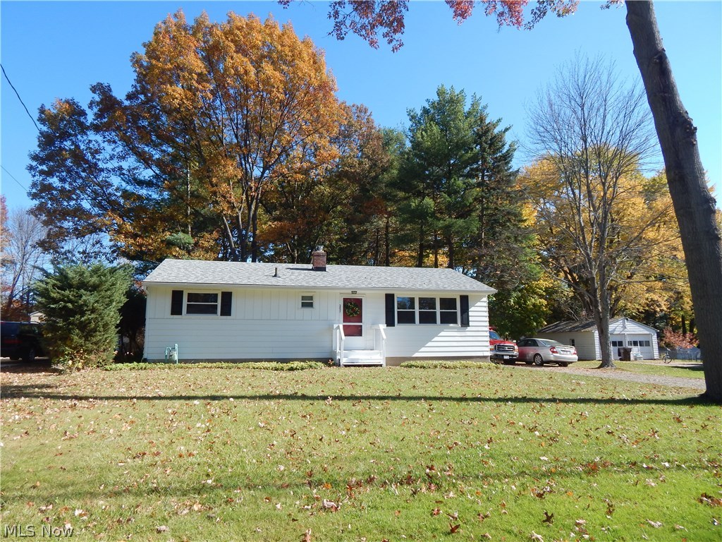 Gorgeously  updated ranch! Move in ready first floor living. Two steps from side foyer into kitchen. New kitchen with SS appliances. 
Hardwood floors, updated full bath. Waterproof basement with Rec. Room. Oversize Garage. Two-Three car. Newer Windows, roof and  featuring  
Large wooded lot, 236 deep.  MOVE IN READY!