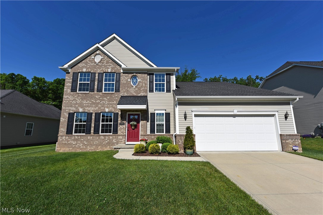 There is nothing basic about this beautiful custom home.  Large active families will love this one! The first floor was designed for family togetherness with the eat-in kitchen and great room. The kitchen features granite countertops, a beautiful ceramic backsplash and stainless appliances.  The view from the kitchen window will enchant!  An eating area opens to a beautiful Trex deck that will undoubtedly be the place where you relax in the evenings to watch wildlife put on a show in your own backyard. The property extends beyond the fence to the tree line at the back of the lot which abuts protected greenspace.  Off the great room the addition houses a bedroom for guests, teens or in-laws with its own en-suite. All the bedrooms are generously sized and feature abundant closet space.  But the basement! It goes on for days! Great storage, cozy family room with built-in shelving units, a full bathroom and yes, another bedroom with walk-in closet! Sculpted carpet, Trex decking, full grain