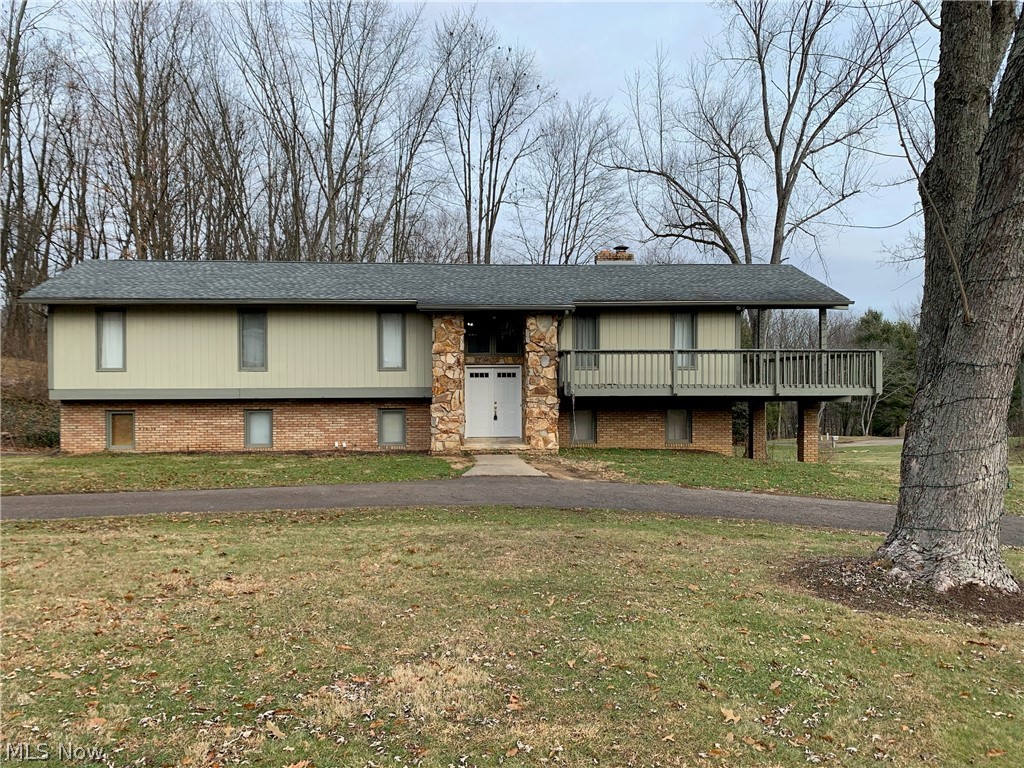 Great location for this large 2,997 sq ft 4 bedroom 2.5 bath Bi-Level sitting on 1.412 acres in Canal Fulton.  This one sits on a dead end street and is close to downtown Canal Fulton, towpath for biking/walking and easy access to Route 21 to head south or north.  Enjoy your morning coffee or evening BBQ on covered porch area on side of home.   Home has large Great Room area with walk out that could be a theatre room or great entertaining area.  Circular drive in front of home.  This home has loads of potential and just needs updating and ideas to make it your own.