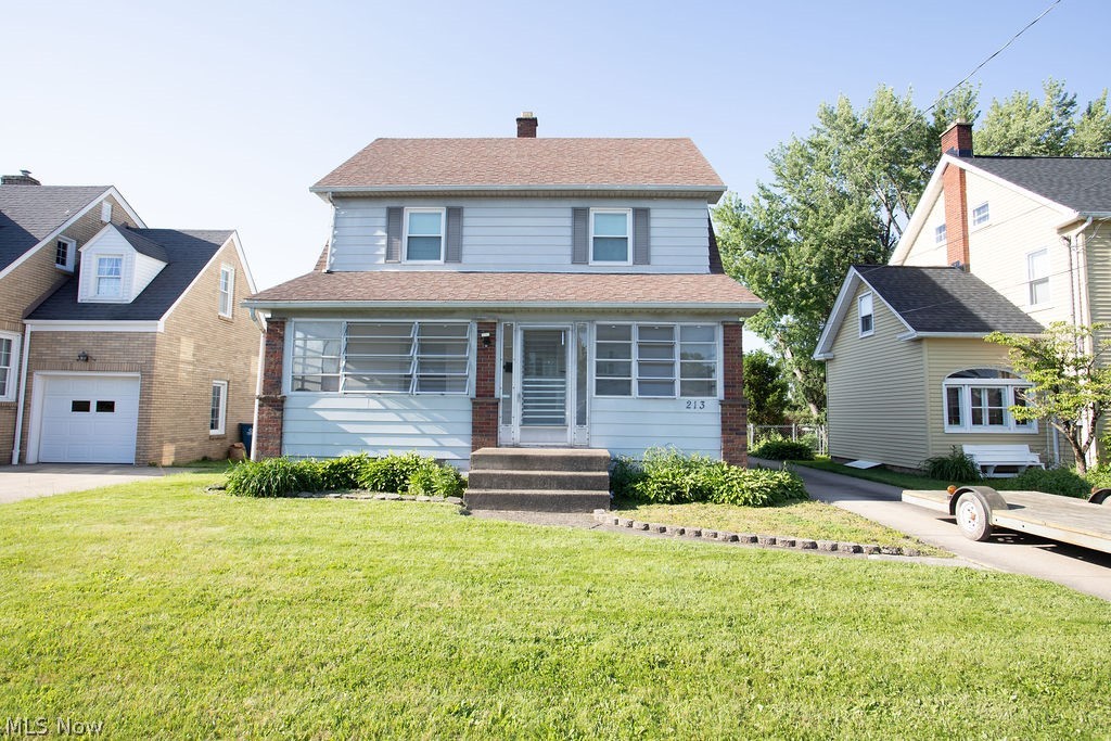 Don't miss out on this spacious and well maintained 3 bedroom home within walking distance of Struthers Schools!  You have to see it to believe it!  Living room with beautifully refaced fireplace, crown molding, and wood floors.  Very large enclosed front porch/sunroom/4 season room has endless possibilities and stays warm year round.  Dining room features beveled glass French doors, built in China cabinet, and wood floors.  Kitchen includes all appliances and has direct access to additional storage space which could be used as a mud room or pantry. High ceilings throughout!  Dry basement includes washer and dryer with sink plus a second bathroom including shower.  There is also additional storage downstairs plus lots of space that could be used for anything...family room, workout room, office, etc.  Three good sized bedrooms, full bath, and built in linen closet complete the second floor.  A huge unfinished attic on the third floor could easily be converted to a 4th bedroom.  Two car detached garage features a new opener, electric, work bench, overhead storage, and automatic lighting.  Fully fenced back yard, 10 year smoke alarm/carbon monoxide detectors, puppy doors, and ceiling fans throughout.  New vinyl back deck done in 2024!  Other updates include:  paint, hot water tank in 2021, furnace in 2019, electric in 2018, central air unit in May 2025 with 10 year transferable warranty, new side and back doors in 2024, mostly all new windows.  Buyer(s) receive one year home warranty for peace of mind. Come see this one before it's gone!
