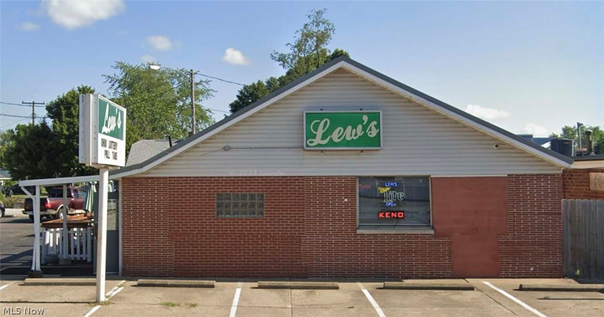 Profitable business opportunity - turnkey tavern in high traffic location. The package includes real estate, assets, and business. “Lew’s Tavern” has been a part of the community for nearly 50 years, well-established. The owner is looking forward to retirement. Real estate offers a 2,792 SF commercial building, with plenty of parking. Large bar area, table seating, billiards, private office, and storage rooms, with a covered outdoor patio space. Regularly maintained, with many updates throughout. Corner lot having road frontage on Lincoln Way and Newport Ave, 3 parcels totaling approximately 0.354 acres. Located in Perry Township, Stark County, parcel numbers 4302380, 4302381, and 4307143. Current licenses include D1, D2, D3, D3A, and D6 liquor, food service operation license, charitable bingo, Keno, and the Ohio Lottery. Recent updates include the roof, furnace, front and rear doors, security system, and parking lot. Additional info, P&L, inventory lists, etc., available upon request.