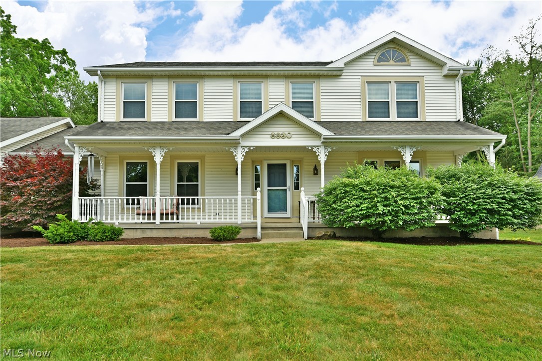 A masterclass in style and comfort, this immersive Howland home is ready to excite with its high style and matching quality that fills its two floors of finished living space! Located within one of the area’s most desirable neighborhoods, the home sits proudly on its elevated lot, showcasing its outstretched, covered front porch and two-car attached garage. Around the back, a massive, composite rear deck area encloses a fantastic swimming pool, ready for summer. Overhead, retractable awnings provide shade on command. Inside, a tiled foyer finds a carpet staircase that rises away towards the second-floor bedrooms. Meanwhile, the softly lit home office space offsets a posh family room where natural light spills in from the tall windows along the front wall. A short hall opens to the central dining space, dividing the remarkable kitchen and the colorfully appointed living room. Artful hanging lights illuminate the shimmering kitchen counters as the matching backsplash offsets custom cabinetry. Large tile flooring continues past stainless appliances to find a bonus room, half bath and first floor laundry services. The carpeted living room provides a towering stone mantle with its crackling gas fireplace, adding to the ambiance. On the second floor, the master bedroom steals the show with its oversized footprint and a must-see full bath with skylight topped shower and a walk-in closet. Three additional bedrooms delight with cozy and colorful surroundings while they accompany a tastefully updated full bath at mid hall. Downstairs at the basement level, drylocked and sealed storage joins an extra full lower bath – making for an easy third finished level if chosen.