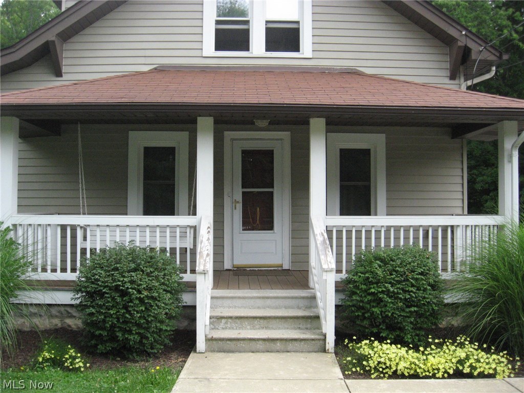 An extraordinary setting situated on the southeast edge of North Perry Village's, 100 acre Townline Park with Lake Erie frontage! Direct access to the lake and utilization of park facilities. Landlord covers water, sewer, trash removal, basic cable television services and even lawn & landscaping maintenance! A charming, well maintained home with picture window views of Lake Erie! Hardwood flooring, generous room sizes, cozy front porch, covered deck and patio. No garage yet ample storage in full, walkout basement and ample parking area.  Electric and gas budget info on file.