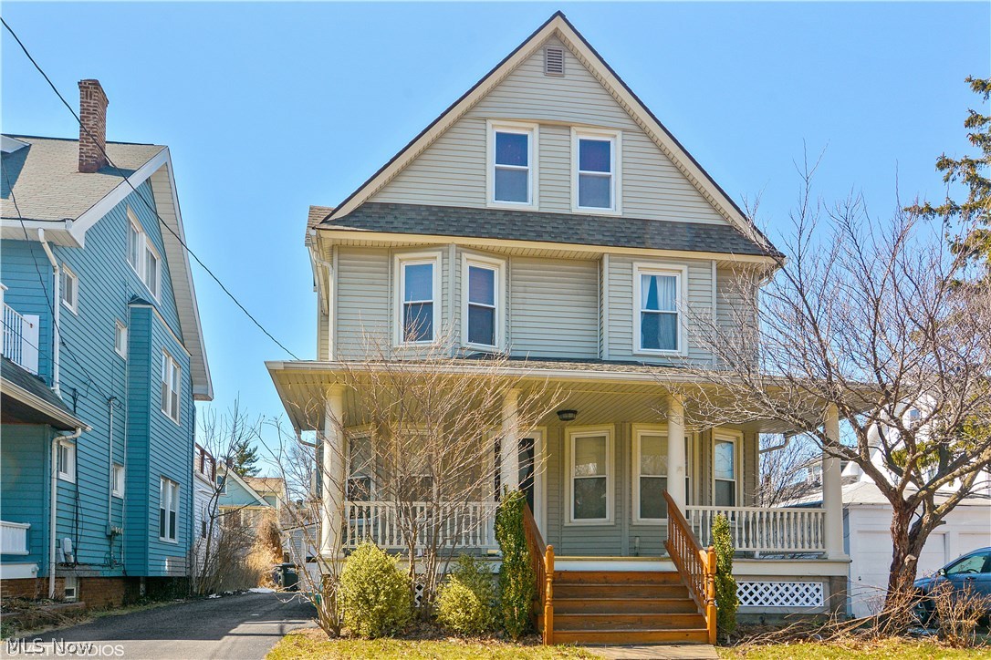 Move right into this 4 bedroom, 2 FULL bath charming Lakewood colonial. This home has all the space you're wishing you had right now. The large living room includes all the traditional features that makes this home so lovely. Natural woodwork that is in exceptional condition, cozy fireplace, and arched doorways. The formal dining room has the cutest window seat also with traditional woodwork. Moving into the kitchen you are greeted with exposed brick, wainscoting trim, and even a nook that provides tons of cabinet space. Upstairs are 4 spacious bedrooms with great closet space, and a full bath with vintage on trend tiling. You will be pleased to find a fully finished expansive third level to make for a possible 5th bedroom. Even the basement is finished and features a rec room, bar area, fully updated bath, and laundry room. Imagine the possibilities with all of this space! Lastly, lets not forget the deck in pristine condition along with the large front porch everyone loves in a Lakew