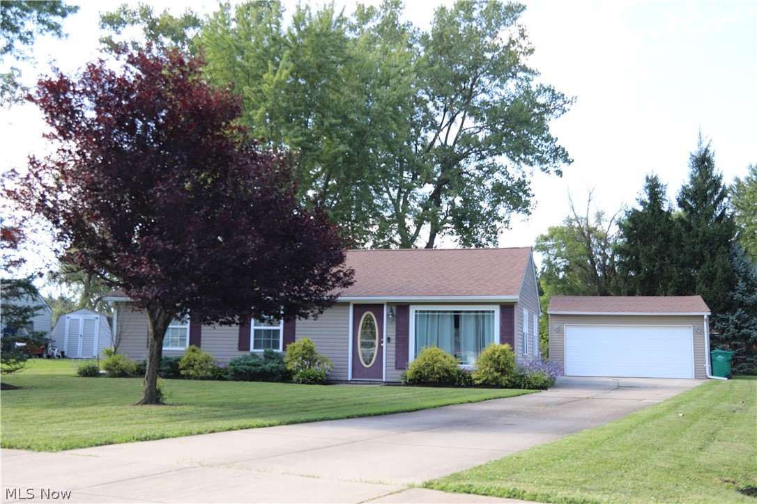 This beautiful ranch home with open floor plan is clean and move in ready! 3 bedrooms and 2 full bathrooms. Front living room opens into dining room and kitchen with breakfast bar. Kitchen features granite counter tops, ample cabinet and counter space and black appliances (gas range, dishwasher and fridge). Beyond the kitchen is a huge great room addition with french doors out to patio and nicely sized backyard. Master bedroom has its own private modernized full bath with shower and room for a vanity. Second full bathroom has granite vanity, bathtub and ceramic floors. Hallway laundry room is convenient and has storage cabinets. Two additional bedrooms with neutral carpet & paint. Two car garage. Easy one floor living, move right in to this gorgeous home!