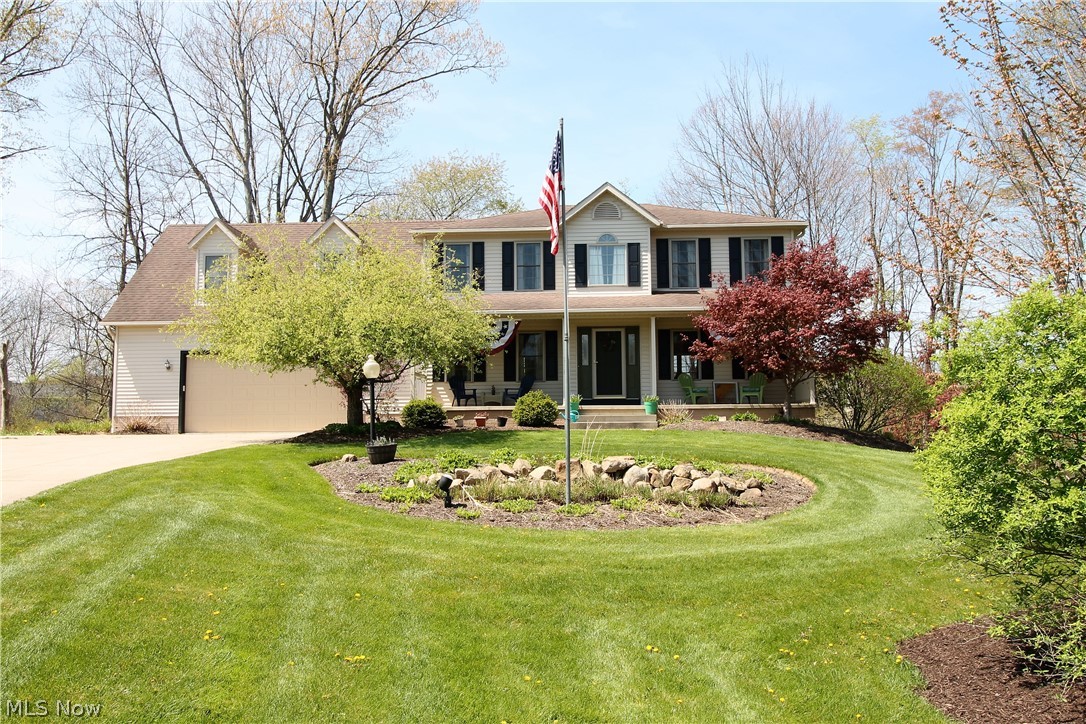 Welcome to this stunning four bedroom, three and half bath colonial home set back on a flag shaped lot. Come on in up from the fabulous patio to the family room, dining room, living room and kitchen. The comfortable, family room has a wood burner with double walled insulation, real wood mantle from the property, cabin grade 3/4' maple wood floors. The open, bright, gorgeous remodeled eat in kitchen has an abundance of Hickory cabinets, granite counters (2015), island, new fridge, microwave (2020), and a slider door to the Trex deck which is elevated with awesome water views and built in shed underneath to the tranquil backyard which has access to the walking trails. Upstairs you will find the laundry area with a utility sink and four large bedrooms that offer commercial grade fans and walk in closets, whole home fan, and a full bathroom. The large master suite with dormers built in storage behind the walls, walk in closet, updated master bath with lifetime Delta faucets, newer tile 60'