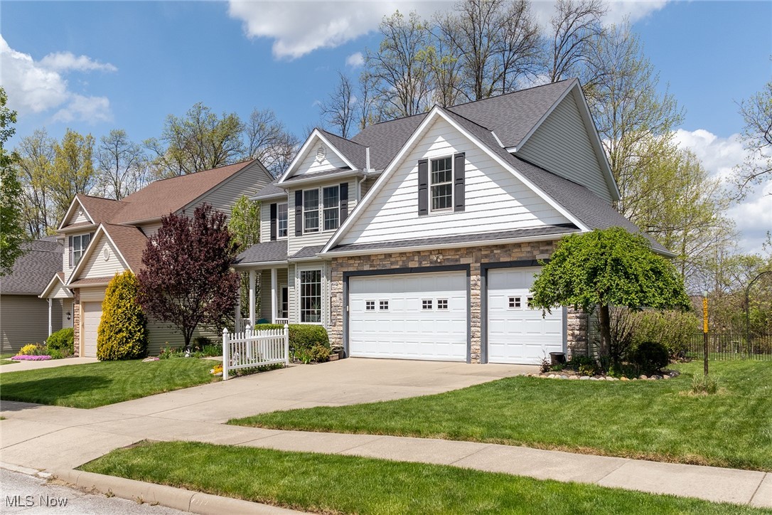Beautiful 4 Bedroom Colonial available August 2025! Located in the Hudson City School District with the bus stop just yards from the driveway. This home boasts hardwood floors throughout the foyer and eat-in kitchen. Kitchen includes beautiful granite countertops with a center island and stainless steel appliances. The open floor plan includes a family room with corner fireplace.The formal dining room and half bath complete the first floor. As you walk up the stairs, you are greeted by the primary bedroom on the left and a cozy reading nook to your right. The primary bedroom features a large walk in closet, full bath with Jacuzzi tub and standing shower. Double sinks with granite countertops complete the room. Three additional bedrooms, an additional full bath and second floor laundry finish this floor. Full finished basement for additional entertainment plus a half bath. This home includes a large 3 car garage and a brick paver patio in the backyard. Schedule your showing today!