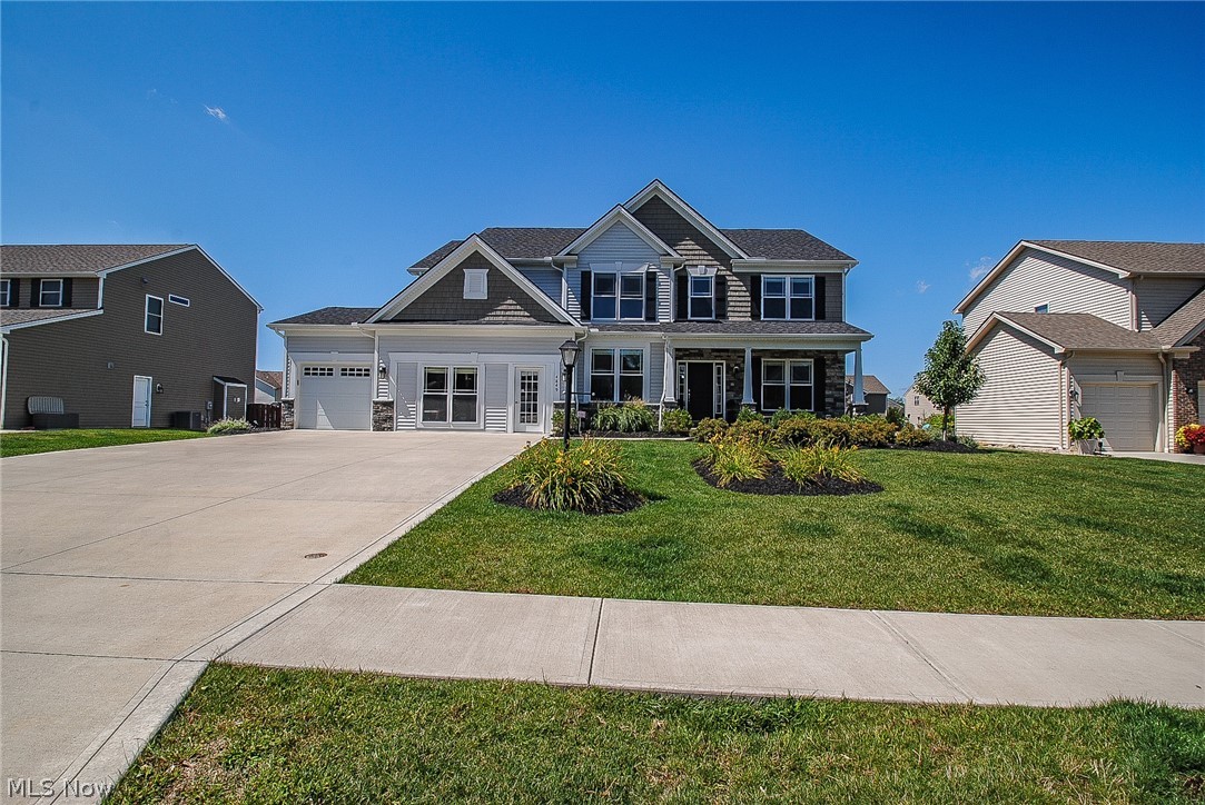 Former Parkview Homes Model …. The Mahogany Jumbo Model …. Loaded With Many Expensive Upgrades …. 3,609 SF Per Builder …. 4 Large Bedrooms Plus 2nd Floor Bonus Media Room …. Wide Open 1st Floor Plan With Tall Windows And Ceilings Providing Lots Of Natural Light …. Gorgeous Kitchen With Enormous Countertop And Cabinet Space With A Large Walk-In Pantry …. Practical Rear Mud Hall With Cubbies …. Wonderful Master Bedroom Suite With Luxury Bathroom Featuring Ceramic Tile Shower And Huge Walk-In Closet …. Smart 2nd Floor Utility Room.... Stamped Concrete Patio …. Inviting Front Sitting Porch …. Fully Landscaped With Sprinkler System …. 3 Car Garage With Two Of The Spaces Used As Former Model Office And Now Used As An Exercise Room Can Be Converted By Builder AT NO COST Back To A Garage Space With New Overhead Garage Door Included By Parkview Homes ….